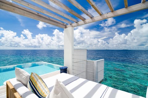 Outdoor pool, open 7:00 AM to 6:00 PM, free cabanas, pool umbrellas