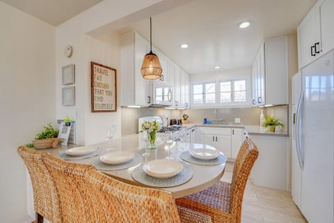 Kitchen has counter top seating and everything you need to prepare a meal at home!