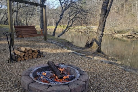 Relax around the firepit as you listen to gentle flow of the Coosawattee River