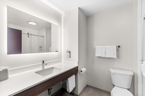 Combined shower/tub, hair dryer, towels, soap