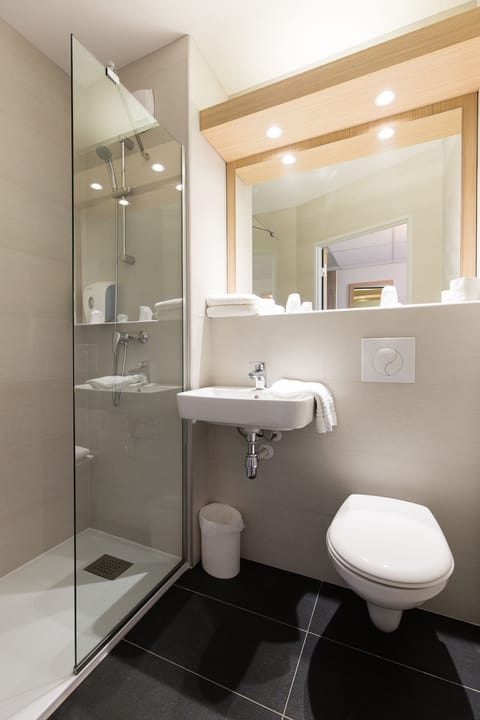 Shower, rainfall showerhead, eco-friendly toiletries, hair dryer