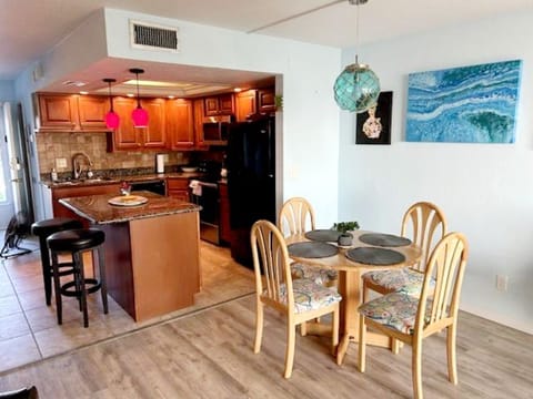 Spacious gourmet kitchen stocked with all cooking necessities