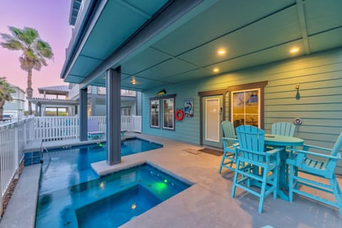 Your private oasis awaits with a sparkling pool and hot tub, perfect for sunset soaks on your covered patio.