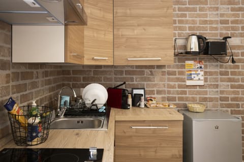 Comfort Condo | Private kitchen | Espresso maker, coffee/tea maker, electric kettle, dining tables