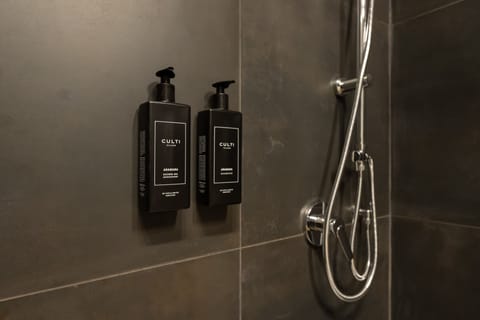 Shower, free toiletries, slippers, towels