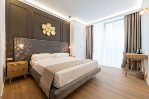 Premium bedding, down comforters, memory foam beds, minibar