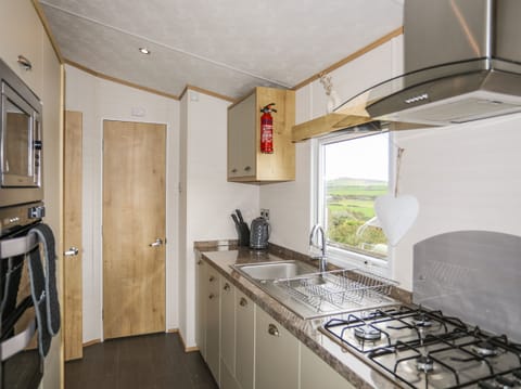 Fridge, electric kettle, toaster, cookware/dishes/utensils