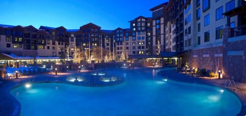 Take a dip in the outdoor heated pool at night