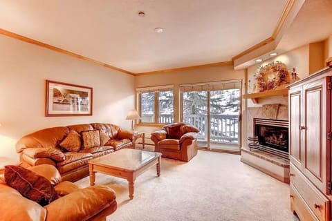 Retreat back into this inviting space and warm up in front of the fireplace