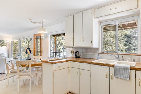 Simply inviting kitchen and dining.