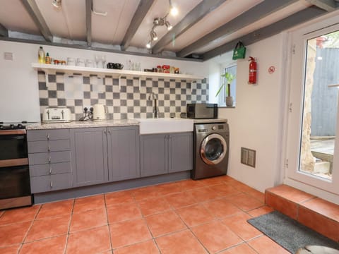 Fridge, electric kettle, toaster, cookware/dishes/utensils