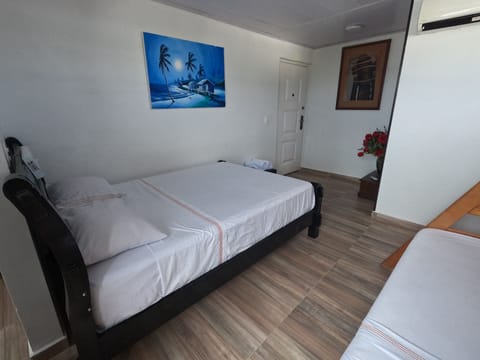 Family Room, Multiple Beds, Ensuite | Iron/ironing board, free WiFi, bed sheets