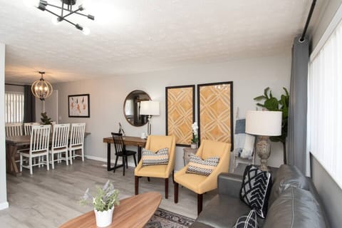 Living room opens up to dining room and kitchen