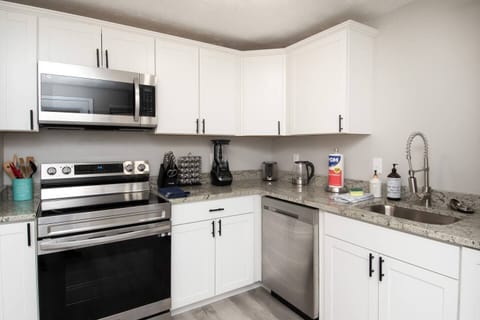 Newly remodeled kitchen with stainless appliances and granite counters!