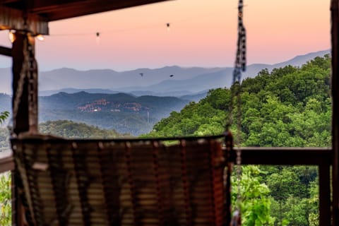 Relax on our Romantic Porch Swing and Enjoy the Breathtaking Mountain Views.