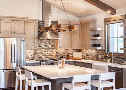 Fully stocked kitchen with modern finishes, ready for you to use