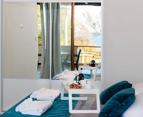 Sunlit Bedroom with Stunning Views from Your Bed