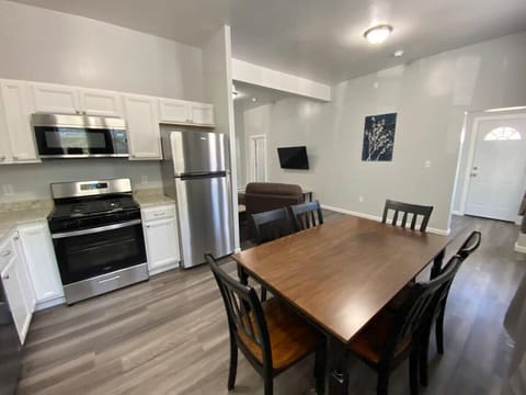 Charming eat-in kitchen with ample space for dining and meal prep.