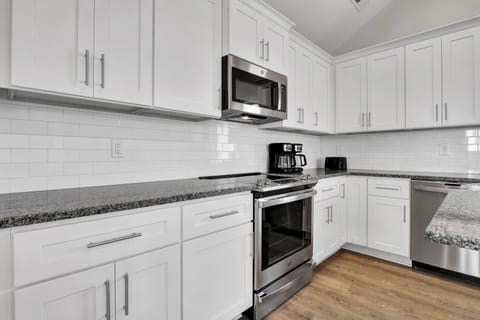 Beautiful, airy, well stocked kitchen to meet all of your needs