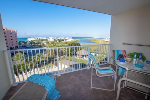 Sip your morning coffee on this stunning balcony overlooking turquoise waters and coastal views that stretch to the horizon.