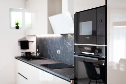 Family Apartment | Private kitchen | Dishwasher, electric kettle, cookware/dishes/utensils