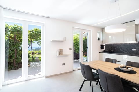 Family Apartment, Bay View | Living area | Flat-screen TV