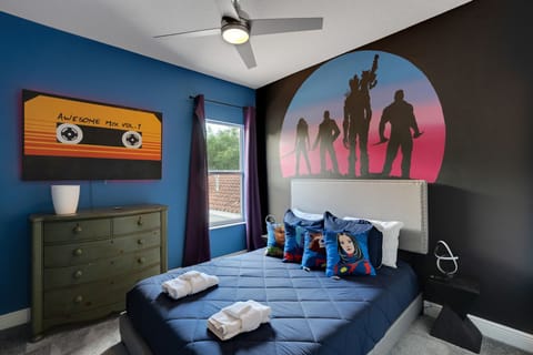 The Guardians of the Galaxy themed twin bedroom includes two comfortable twin beds-a cozy setting perfect for family and friends.