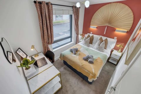 Bedroom with a double-bed and dedicated workspace at Blue Puffin Stays Short Lets & Serviced Accommodation