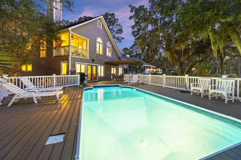 Enjoy the amazing private pool, hot tub, and marsh views!