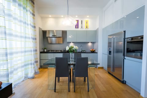 Deluxe Apartment | Private kitchen | Full-size fridge, oven, stovetop, dishwasher