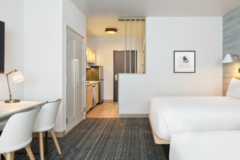 Desk, laptop workspace, blackout drapes, iron/ironing board