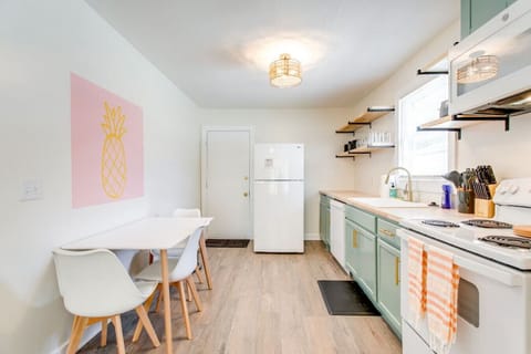 Kitchen with a small dining room table.