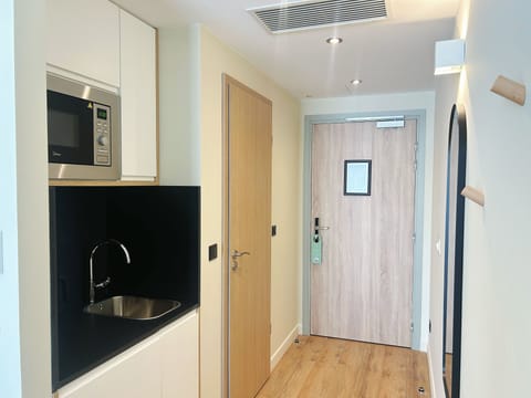 Standard Room, 2 Twin Beds, City View | In-room safe, desk, laptop workspace, blackout drapes