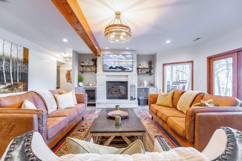Lower level with TV and fireplace