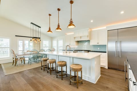 Adjacent open kitchen and dining area