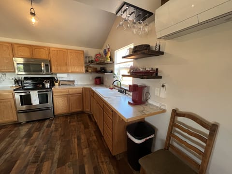 Kitchen is fully stocked with coffee and teas for morning start.