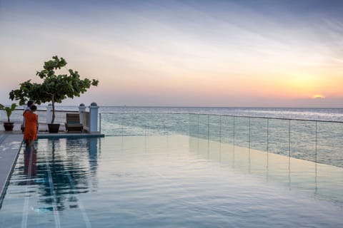 Outdoor pool, pool umbrellas, sun loungers