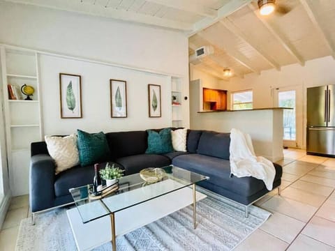 Cozy Retreat: Our inviting living space is your ideal spot for unwinding, complete with a comfy sofa and entertainment.