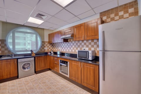 Two-bedroom Deluxe city view Apartment with Free Beach Transfer and 15% F&B Discount. | Private kitchen | Microwave, stovetop, coffee/tea maker, electric kettle