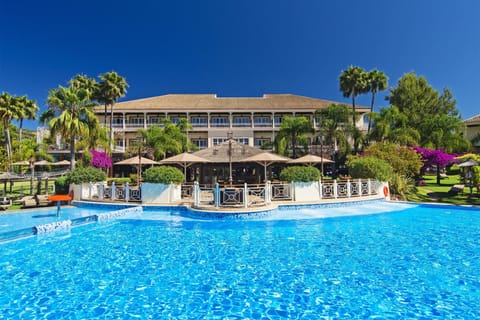 Indoor pool, outdoor pool, open 9:00 AM to 9:00 PM, pool umbrellas