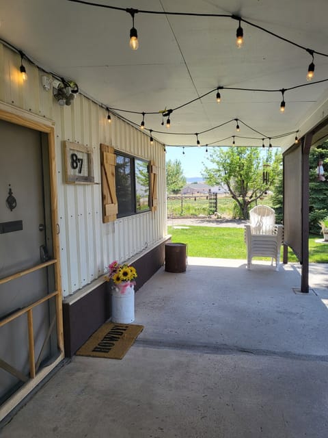 A fun western-facing patio with cute outdoor lights make it a charming hangout.