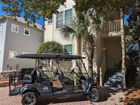 - Explore the area with ease to your very own 6 seater golf cart, included with your stay - Swaying palms, this charming home welcomes you with shady porches & coastal charm - Park, unpack, & start your adventure, the beach & town are just a ride awa