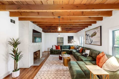 Open living area with cozy seating and fireplace.