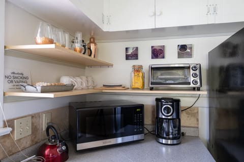 Fridge, microwave, and coffee avaliable