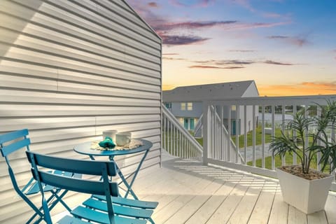 Enjoy sunrises & sunsets from the private patio with lake & pool views