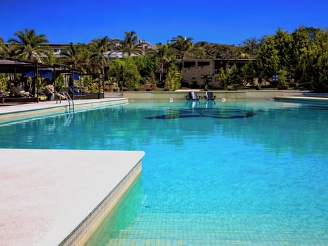 Outdoor pool, open 10:00 AM to 7:00 PM, sun loungers