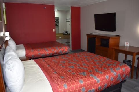 Room, 2 Double Beds | Desk, blackout drapes, iron/ironing board, rollaway beds