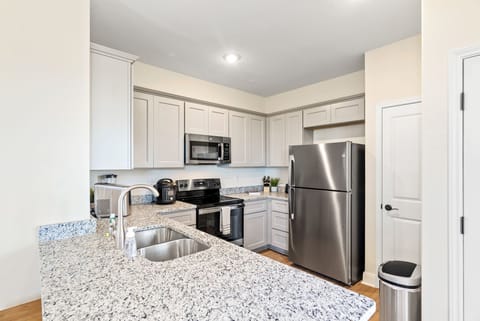 Plenty of workspace on the new granite countertops.