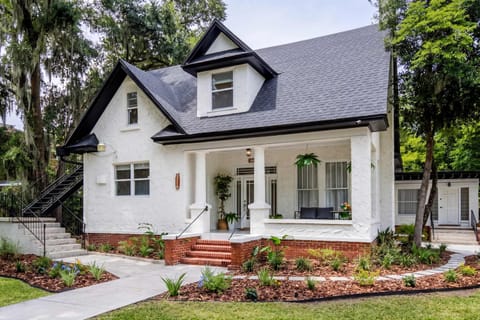 Charming White Cottage Oasis – Historic Character Meets Modern Luxury.