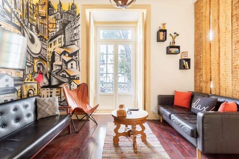 1 Open and inviting living room perfect for socialising and relaxing • StayInLisbon